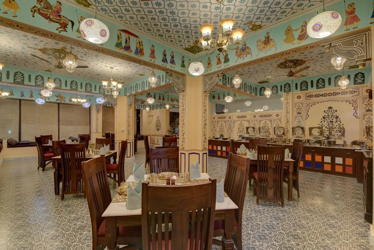 Hand-painted heritage ceiling in the indoor dining hall at Jaajam
